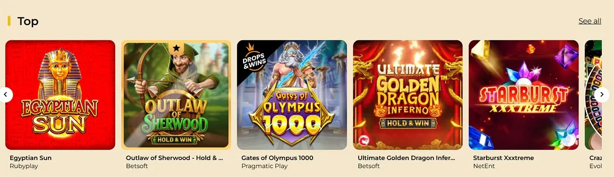 “Top” games carousel showing slot thumbnails for Egyptian Sun, Outlaw of Sherwood (Hold & Win), Gates of Olympus 1000, Ultimate Golden Dragon Inferno (Hold & Win), and Starburst XXXtreme, with navigation arrows and a “See all” link.