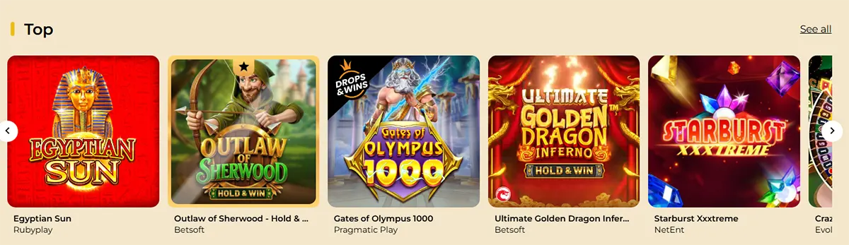 “Top” games carousel showing slot thumbnails for Egyptian Sun, Outlaw of Sherwood (Hold & Win), Gates of Olympus 1000, Ultimate Golden Dragon Inferno (Hold & Win), and Starburst XXXtreme, with navigation arrows and a “See all” link.